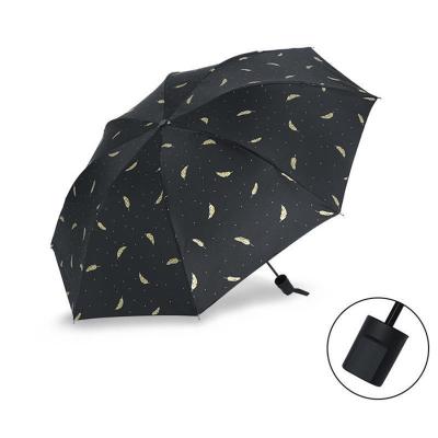 China New Style Modern Sunscreen Folding Umbrella 8 Feather Three Folds Manual Bone Golden Umbrella for sale