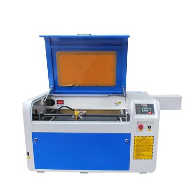 China wholesale price 4060 interactive system mini laser engraving machine 50w laser wood cutter engraver for non-metal for sale