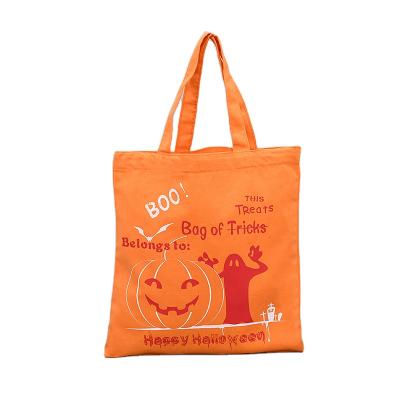 China Customized Halloween Easter Pumpkin Grin Cotton Canvas Folding Portable Bag for sale