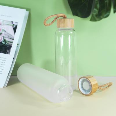 China wholesale price 480ml 500ml PORTABLE sublimation frosted sport water bottle with lid and bamboo rope for sale