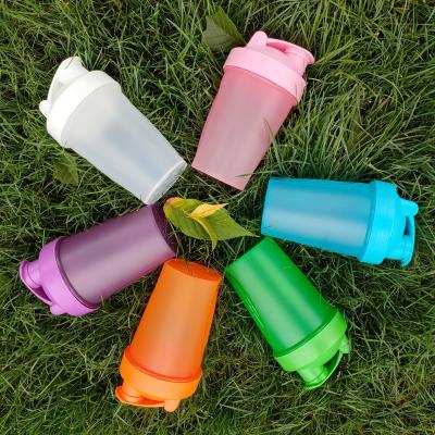 China Hot Sale Multi Color 400ml Shake Cup Eggnog Fitness Sports Viable Sprinkle Cup Bottle With Stirring Ball For Protein Powder for sale