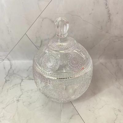 China 2021 Viable Hot Selling Glass Embossing Candy Jar And Candle Jar With Lid For Wedding Holiday Or Household for sale