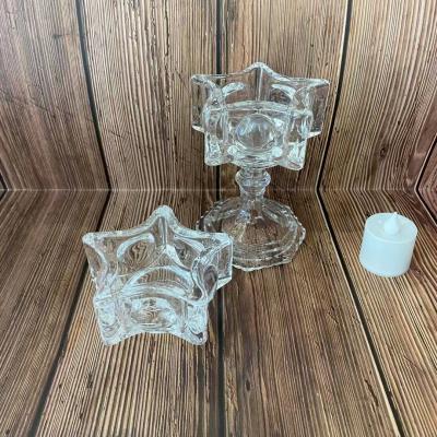 China 2021 luxury modern star pentagon and pearl point hot-saling glass candlestick without cover for party atmosphere and home decoration for sale