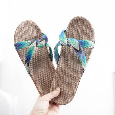 China Fashion Trend Women's Flip Flops Style Criss-Cross Breathable Canvas Designer Flat Slippers for sale