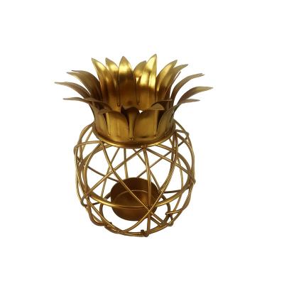 China Custom Gold Home Decorative Christmas Decoration Pineapple Shape Handmade Gift Decor Metal Candle Holder Home Candlestick for sale