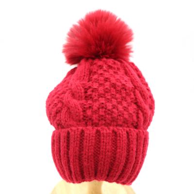 China COMMON Factory Custom Skull Knitted Bobble Hat Wholesale Ski Warm Winter Cap Acrylic Pom Pom Beanie for sale