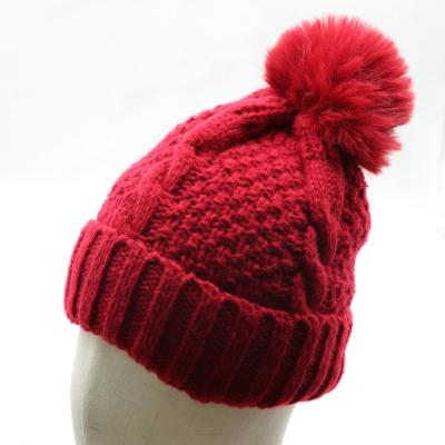 China COMMON Thick Cable Knit Faux Fuzzy Fur Pom Fleece Lined Skull Cap Cuff Beanie for sale