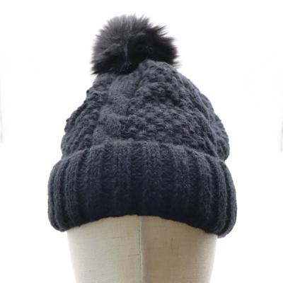 China COMMON Womens Winter Ribbed Beanie Crossed Cap Chunky Cable Knit Pompom Soft Warm Hat for sale