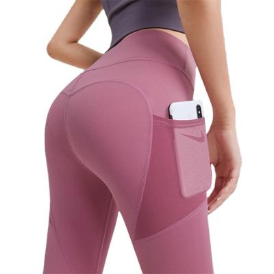 China Breathable High Quality Gym Yoga Wear Flared Seamless Womens Yoga Pants Fitness Butt Crac! crack! elevator gaiters with pockets for sale