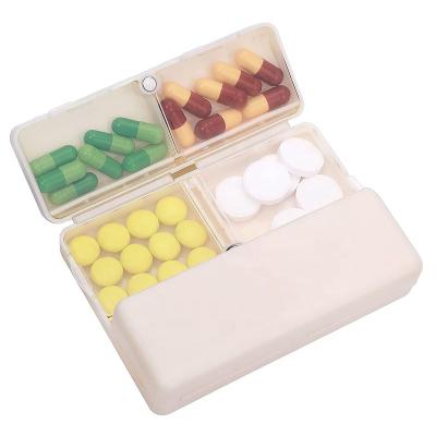 China Plastic Magnetic Daily Box 7 Compartments Foldable Travel Pills Organizer Pill Storage Box Weekly Pill Case Dispenser for sale