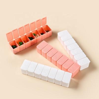 China Plastic 7 Day Pill Organizer Storage Box Pink with Braille Pill Case Vitamins Fish Oil Supplements for sale