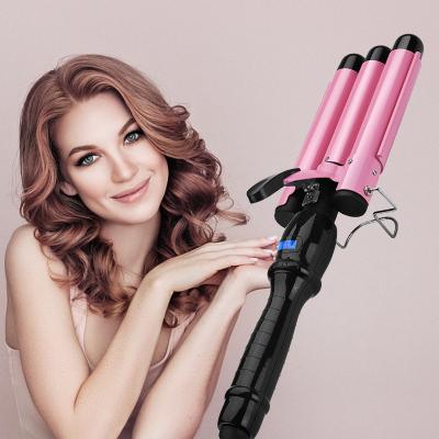 China 3 Barrel Rack Design Anti PTC High Heat Electric Hair Scalding Rotating Curling Iron Base New For Home Use for sale