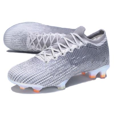 China Fashion\comfortable\durable  Football Boots Wholesale New soccer shoes FG professional long spikes non-slip sport indoor turf football boots CR7 chuteiras importadas futsal for sale