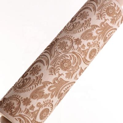 China Brown Traditional Wooden Snowflake 3D Embossing Christmas Printing Rolling Pin Wooden Carving Dumpling Baking And Cake Decoration for sale