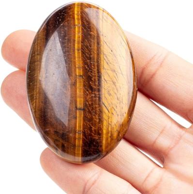 China China Tiger's Eye Palm Stone Natural Crystal Chakra Reiki Polished Healing Oval Pocket Worry Stone For Worry Relaxation Therapy for sale