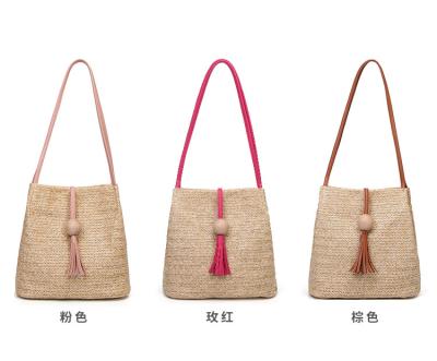 China 2020 Vintage Beach Straw Tote Bag Tassel Shoulder Bag Hot Selling Online Natural Shipping Paper Bag for sale