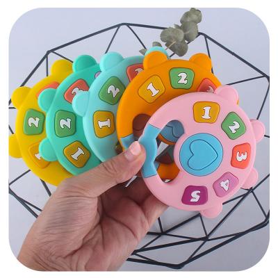 China DsorbabNon-Toxic BPA Free Silicone Chewable Baby Teething Toy Food Grade Creative Digital Baby Teether Toy D049 for sale