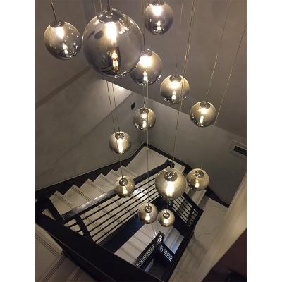 China Modern bubble glass ball stairs LED deckenleuchte lampadario chain candelabros avize lampara colgante luster pendant light chandeliers for sale