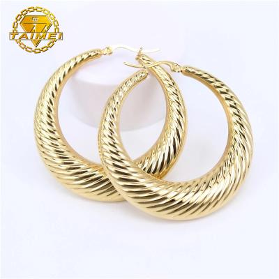 China TRENDY gold color classic stainless steel women circle earrings girls shape large earrings korean threaded hollow earrings for sale