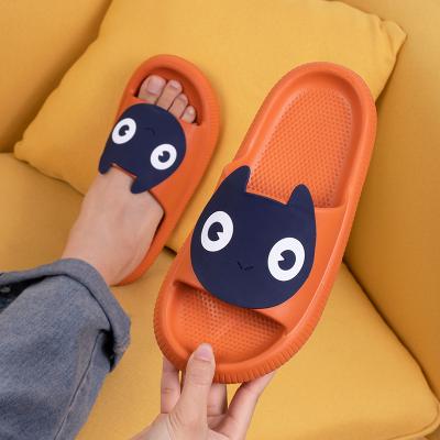 China Anti-odor cartoon big-eyed black one-piece face soft bottom soft briquettes slips men's slippers women's summer home sandals slippers for sale