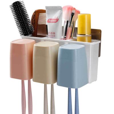 China Wall Mounted And 3 Cups Eco-friendly Multifunctional Toothbrush Holder Bathroom Plastic Storage Set Toothbrush Holders for sale