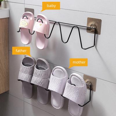 China Shuangqing Bathroom Home Dormitory Shoe Convertible Artifact Storage Free Punch Door Behind Stainless Steel Wall Mounted Slippers Rack for sale