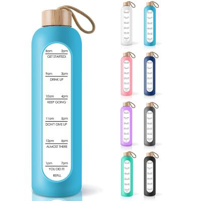 China BPA 32 Ounce Borosilicate Glass Cup Time Marker Viable Free Motivational Water Bottle With Bamboo Lid And Silicone Sleeve for sale