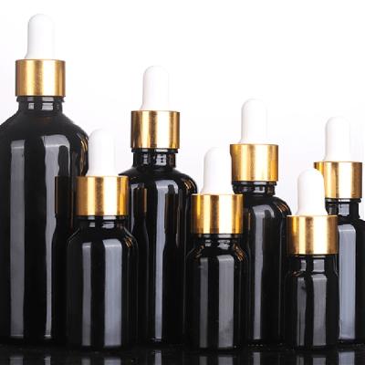 China Custom Wholesale Black 5ml 10ml 15ml 20ml 30ml 50ml 100ml Essential Oil Cosmetic Oil Dropper Bottle Glass Oil Dropper Bottle for sale