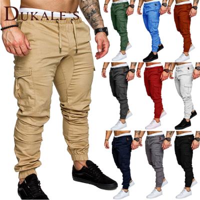 China Anti-Wrinkle In Running Drawstring Jogger Mens Male Track Pants Workwear Multi-pocket Woven Fabric Trousers Man Casual Drawstring Trousers for sale