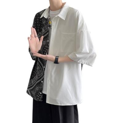 China Anti-wrinkle sleeve fashion five-point shirt for men, cashew flower Hong Kong style casual men's shirt, loose plus size shirt for sale