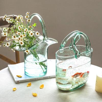 China Eco-friendly Nordic Shape INS Flower Vase Plant Glass Hydroponic Vases Handbag Fish Pot Tank Fish Tanks Living Room Desktop Decoration for sale