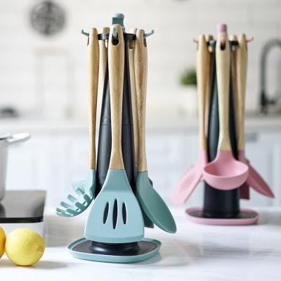 China Viable Kitchen Cookware Set Silicone Turner Soup Ladle Scoop Spatula Scraper Pasta Server Skimmer With Rotating Rack Cookware for sale