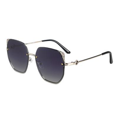 China UV400/A Polarized 2022 Retro Fashion Women Sunglasses Metal Luxury Oversized Rimless Custom Acetate Polarized Sun Glasses for sale