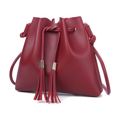 China 2020 New Fashion Ladies PU Leather Shoulder Bag Custom Leather Cross - Body Bag Purses And Handbags With Tassel for sale