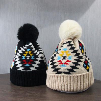 China COMMON New Style Thicken Beanie Hat Winter Warm Fur Colorful Fleece Striped Bobble Ball Jacquard Women Knit Beanies Hat for sale