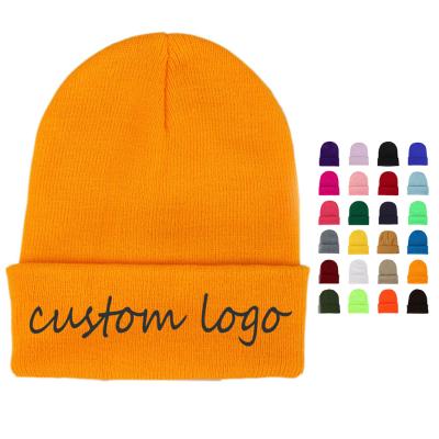 China Custom 100% COMMON Acrylic White Logo Label Cuffed Plain Beanie Hat Trawler Knitted Beanie Embroidery Ribbed Winter Hat for sale