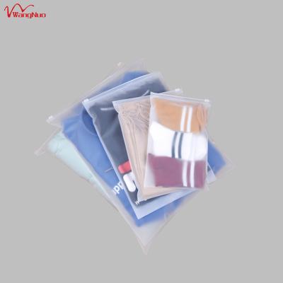 China 35 x 45 cm Biodegradable Matte T-shirt Garment Packaging Security Bags Frosted Zip Lock Bag With Logo for sale