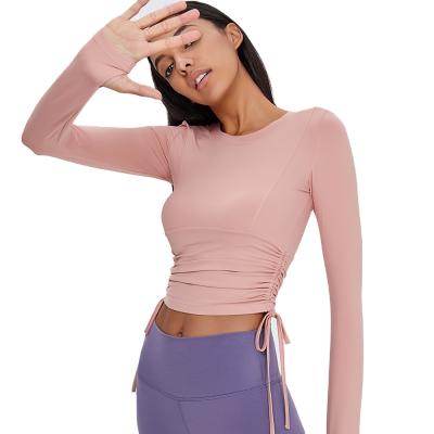 China Fit / Fashion / Slim Skin Friendly / Belly Button Exposed Bilateral Lace Up Yoga Sports T-Shirt Tight Naked Long Sleeve Women Tops Fitness for sale