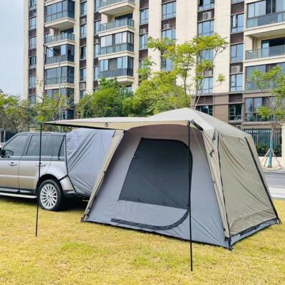 China Diagonal Tether Type Hot Sale Travel Picnic Fishing 4-6 Person Family Camper Trunk Suv Portable Tailgate Tent Car Rear Parking Tent for sale