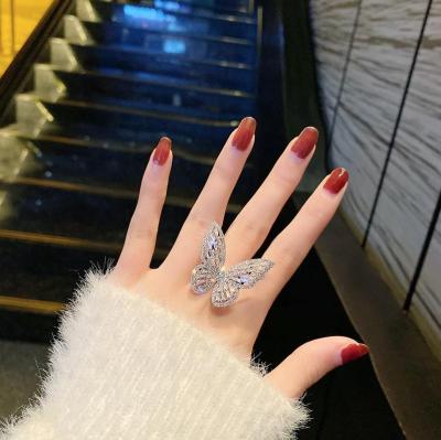 China Rhinestone Crystal Butterfly Ring Jewelry Women's Ring Luxury Shiny Zircon Bling Insti Fashion Jewelry Full Copper Luxury Party Opening for sale