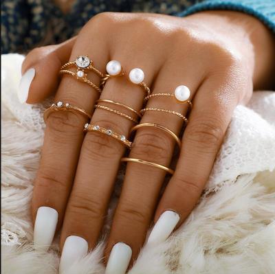 China FASHIONABLE Open Jewelry Women's Elegant Gold Pearl Rings 8Pcs /set Ladies Wedding Bohemian Joint Ring Set for sale