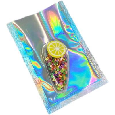 China One Side One Side Clear Holographic Moisture Proof Foil Pouch Heat Seal Aluminum Foil Bags With Tear Notch for sale