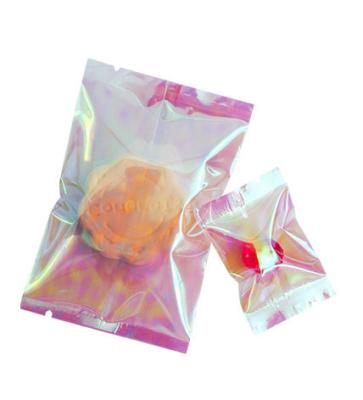 China Heat Seal Moisture Proof Bags For Candy And Food Packaging , Rainbow Light Pink Holographic Bags for sale