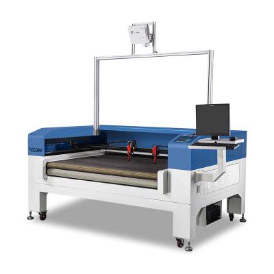 China Automatic Two Head Laser Ladies Blouse Pattern CO2 Laser Cutting Machine With Auto-Feeding System for sale