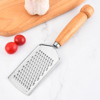 China Sustainable Kitchen Instrument Vegetable Grater Stainless Steel Vegetable Grater With Comfortable Wooden Handle Cheese Grinder for sale