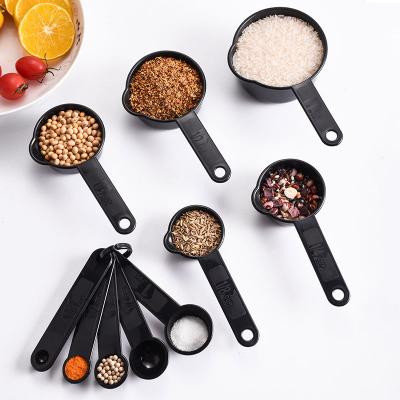 China 11 Piece Sustainable Kitchen Measuring Tool Kit with Colored Plastic Measuring Cup and Jigger for sale