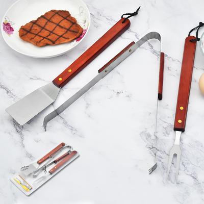 China Easily Cleaned Multifunctional Factory Batch 3 Stainless Steel BBQ Tool Accessories Set With Wooden Handle for sale