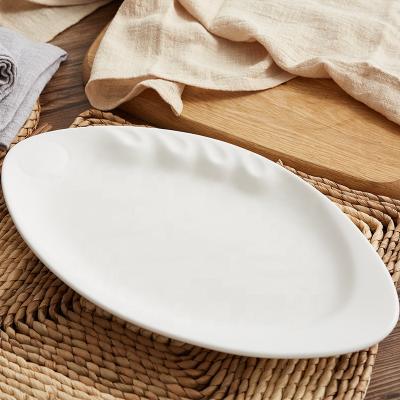 China Sustainable White Oval Embossed Small Splint Luster Exquisite Durable Porcelain Dinnerware for sale