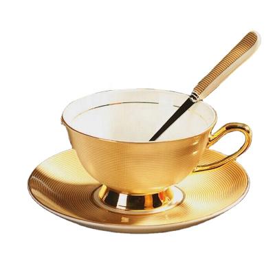 China Viable Luxury Fine Bone China Design Gold Tea Cup And Saucer Set Ceramic Coffee Mug for sale