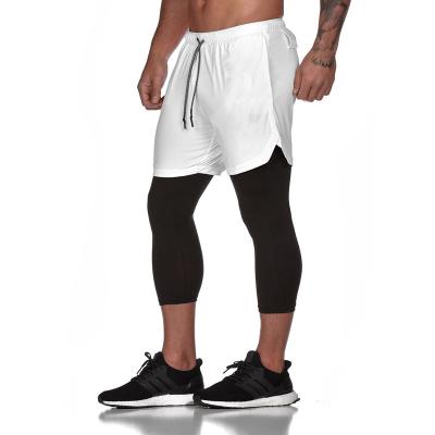 China Solid Color Breathable Breathable Well-Fitting Running Cropped Shorts Men's Athletic Shorts Tracksuits Basketball Shorts for sale